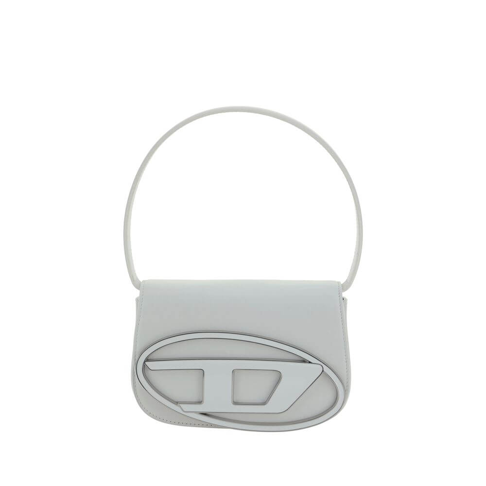 White Calf Leather Bos Taurus Shoulder BagThe 1DR Shoulder Bag by Diesel is made of mirrored leather with a flat shoulder strap. It has a front magnetic closure and the brand’s embossed Oval-D logo. Inside is a welt pocket to keep items in order. A modern