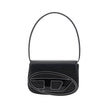 Black Calf Leather Bos Taurus Shoulder BagThe 1DR Shoulder Bag by Diesel is made of mirrored leather with a flat shoulder strap. It has a front magnetic closure and the brand’s embossed Oval-D logo. Inside is a welt pocket to keep items in order. A modern