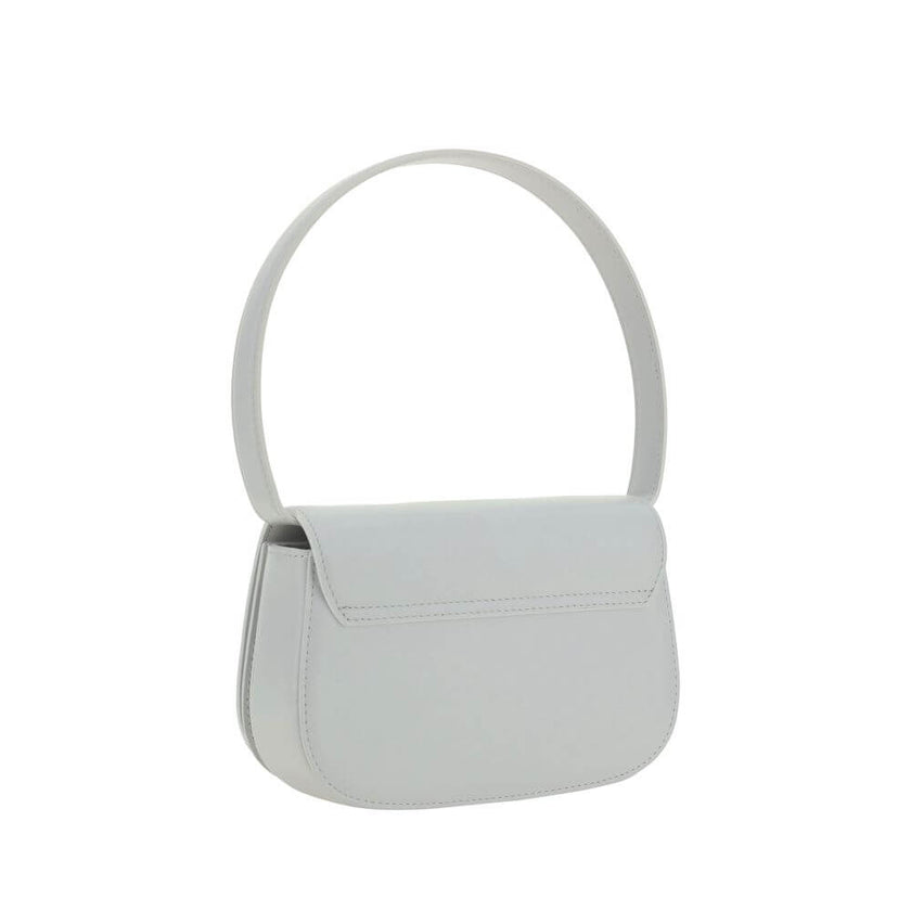 White Calf Leather Bos Taurus Shoulder BagThe 1DR Shoulder Bag by Diesel is made of mirrored leather with a flat shoulder strap. It has a front magnetic closure and the brand’s embossed Oval-D logo. Inside is a welt pocket to keep items in order. A modern