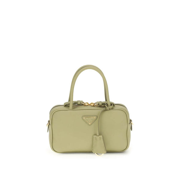 Green Calf Leather Bos Taurus HandbagThe Handbag by Prada combines elegance and functionality in an iconic design. Featuring two tubular handles and a zip closure, it is embellished with a triangular logo plaque on the front, the brand’s distinctive symbo