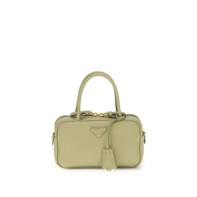 Green Calf Leather Bos Taurus HandbagThe Handbag by Prada combines elegance and functionality in an iconic design. Featuring two tubular handles and a zip closure, it is embellished with a triangular logo plaque on the front, the brand’s distinctive symbo
