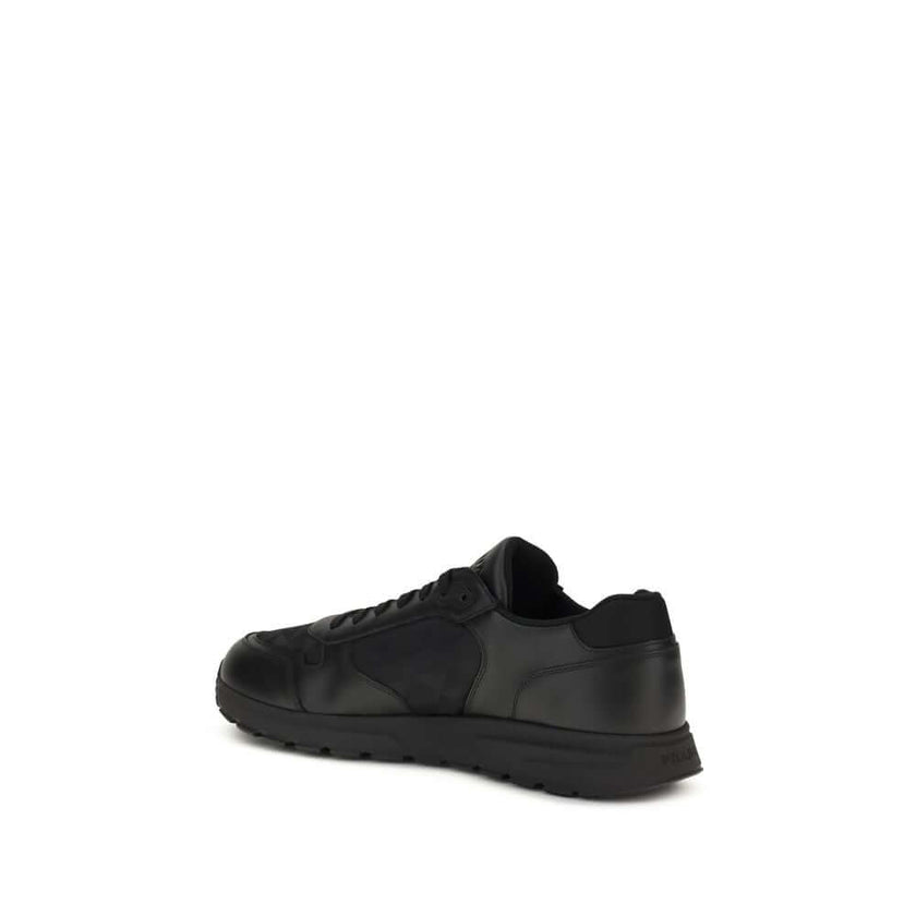 Black Recycled Polyamide Athletic SneakersSneakers by Prada, made of Re-Nylon and brushed leather, combine contemporary style and innovative materials. Equipped with laces, they feature an enameled triangle logo on the upper and screen-printed Prada Milan