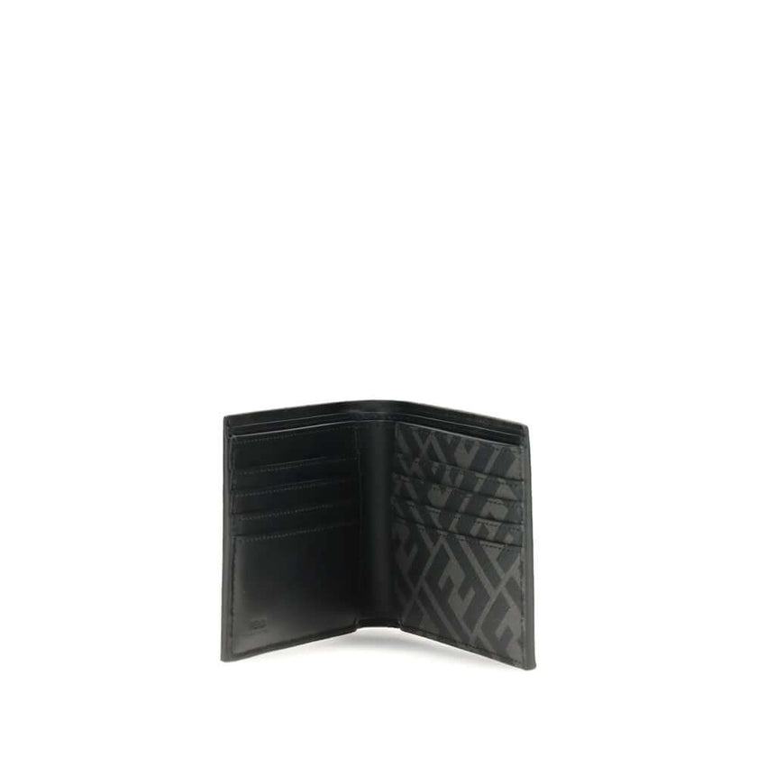 Black Calf Leather Bos Taurus WalletLeather Wallet by Fendi with an elegant and functional design, featuring the classic bifold model. The front is decorated with the three-dimensional plaque of the iconic FF logo, while the back features the contrasting