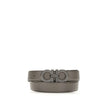 Gray Calf Leather Bos Taurus BeltGancini Belt by Ferragamo is a refined and versatile accessory made of grained leather with reversible, two-tone construction, ideal for adapting to different looks. The Gancini buckle with ruthenium finish features vertic