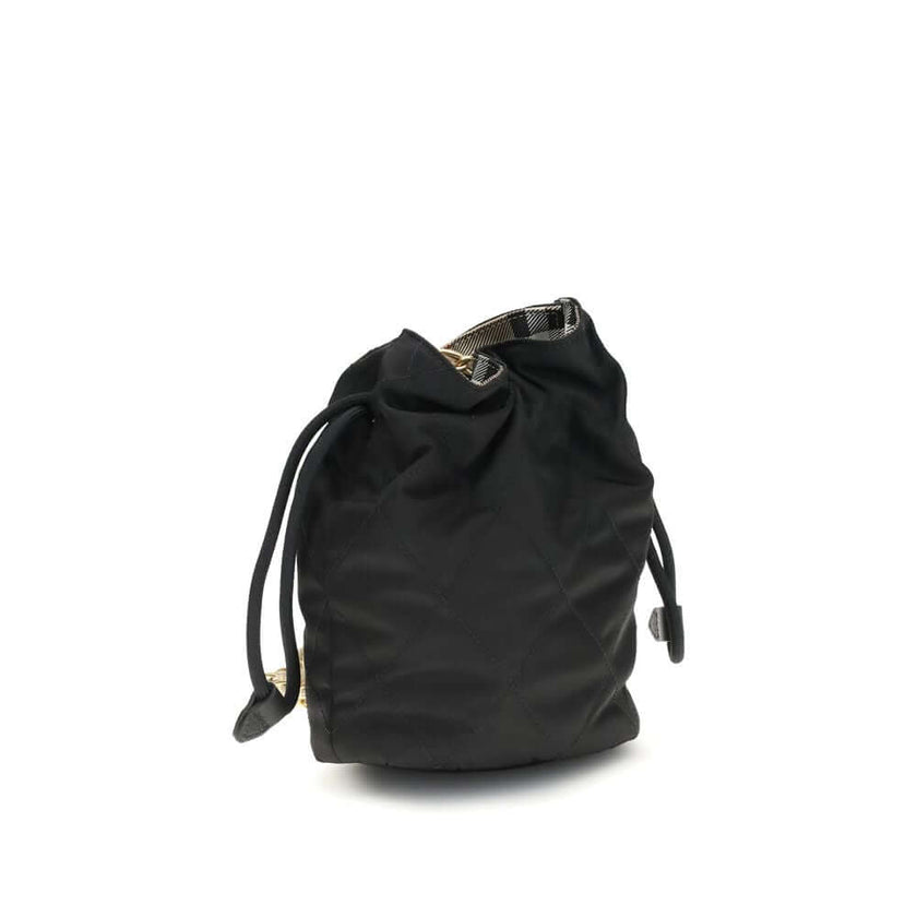 Black Nylon Shoulder BagHorseshoe Bucket Bag by Burberry is made of quilted canvas and embellished with the Equestrian Knight Design applique on the front. It features a metal chain shoulder strap and a drawstring closure, combining practicality and iconi