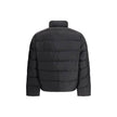 Re-nylon Down JacketPrada’s re-nylon Down Jacket combines sustainability and functionality with a modern design. It features a front zipper closure, two side pockets and a welt pocket on the chest. The distinctive triangular plaque sewn on the front and t