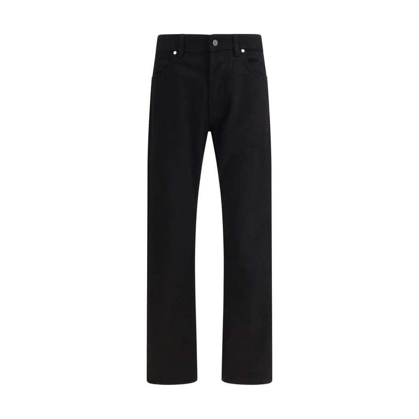 Black Cotton Jeans DenimThe denim Pants by Stone Island combine essential style with functional detailing. Featuring a regular waist with belt loops and a classic five-pocket design with rivets, they are built for durability and everyday wear. A versatile