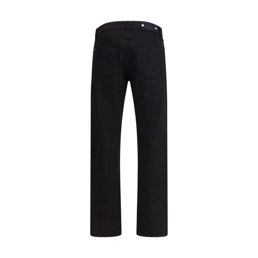 Black Cotton Jeans DenimThe denim Pants by Stone Island combine essential style with functional detailing. Featuring a regular waist with belt loops and a classic five-pocket design with rivets, they are built for durability and everyday wear. A versatile
