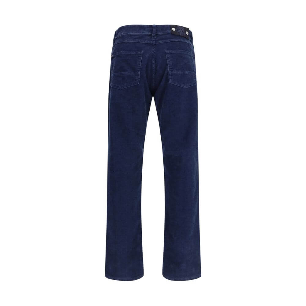 Blue Cotton Straight-Leg JeansThe straight-leg corduroy Trousers by Stone Island blend refined style with utilitarian spirit. Crafted from cotton corduroy, they feature a concealed zip and button closure, two slanted front pockets, and two back welt pocke