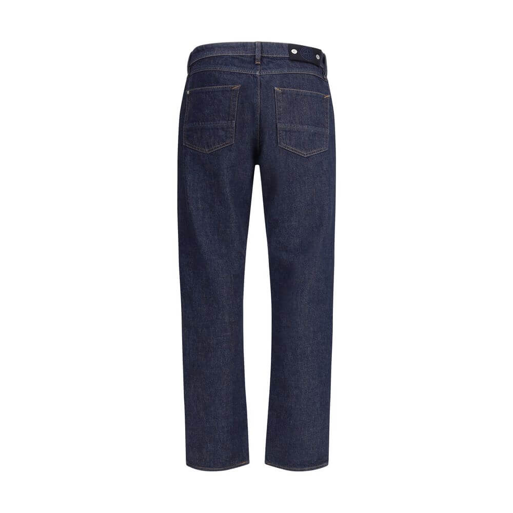 Blue Cotton Cropped JeansThe Stone Island Denim-Rinsed Jeans offer a refined take on a wardrobe essential, featuring a dark wash and distinctive contrast stitching. Crafted from durable denim, they include a regular waist with belt loops, button fastening
