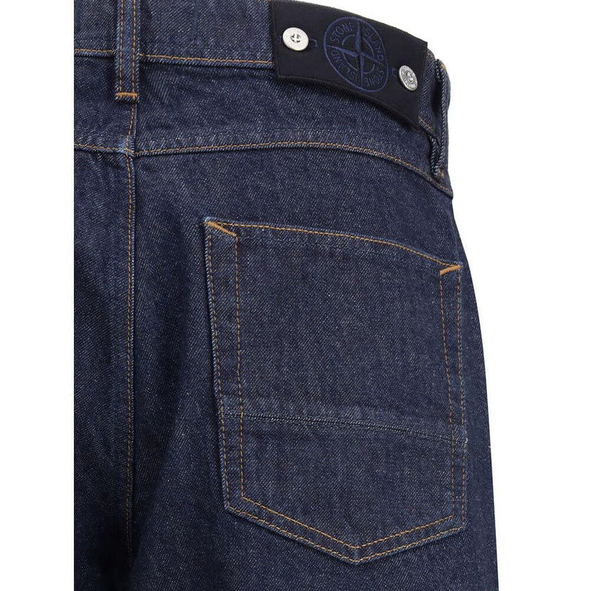 Blue Cotton Cropped JeansThe Stone Island Denim-Rinsed Jeans offer a refined take on a wardrobe essential, featuring a dark wash and distinctive contrast stitching. Crafted from durable denim, they include a regular waist with belt loops, button fastening
