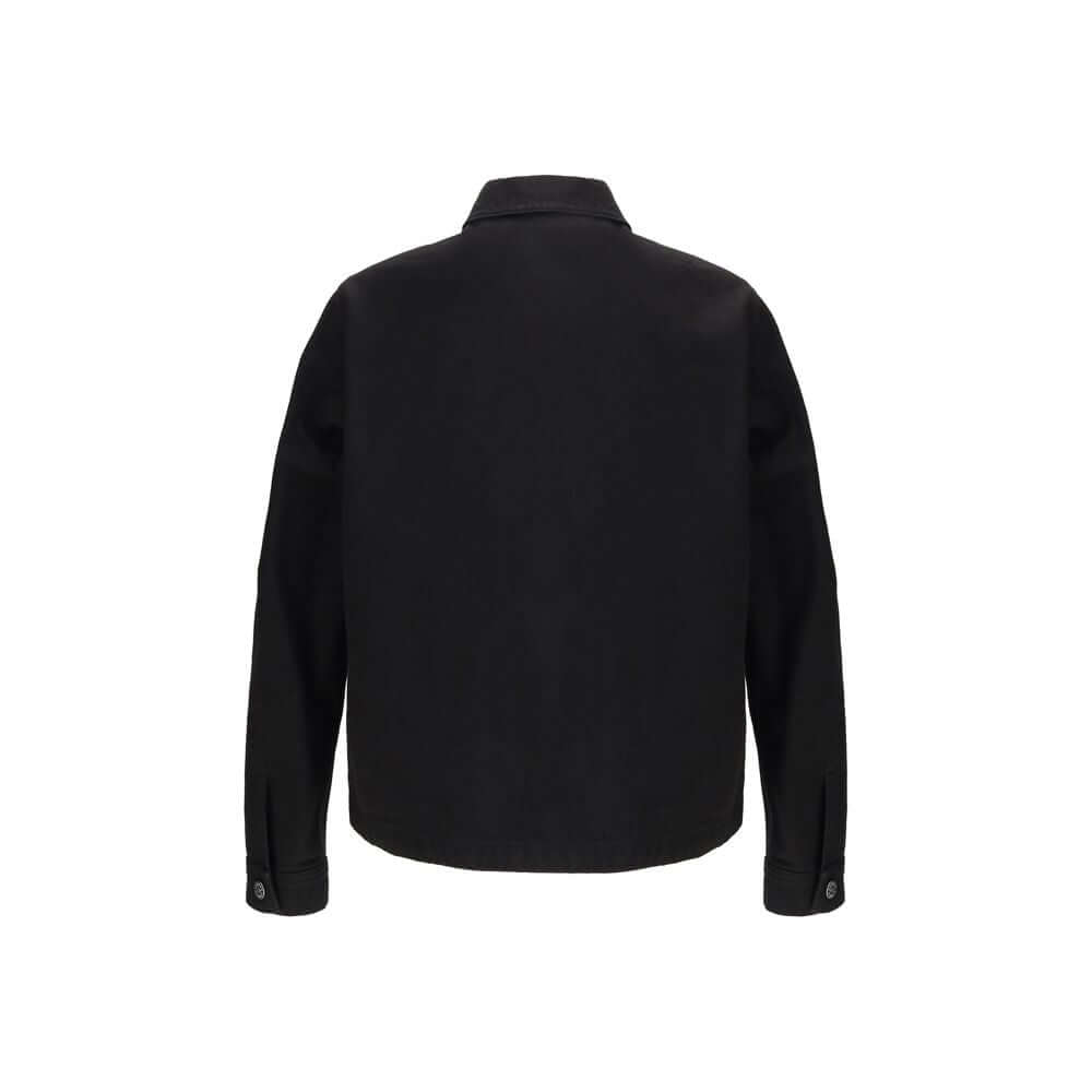 Black Cotton CoatThe Stone Island cotton Shirt is crafted with an essential design enriched by functional details. Chest patch pockets and snap button fastening give it a modern, utilitarian edge, while the iconic sleeve logo on the left arm completes the