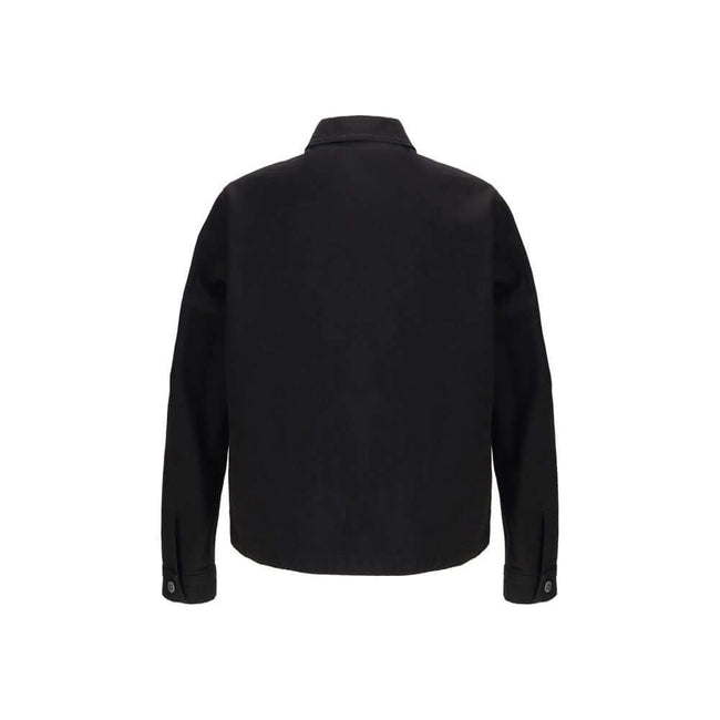 Black Cotton CoatThe Stone Island cotton Shirt is crafted with an essential design enriched by functional details. Chest patch pockets and snap button fastening give it a modern, utilitarian edge, while the iconic sleeve logo on the left arm completes the