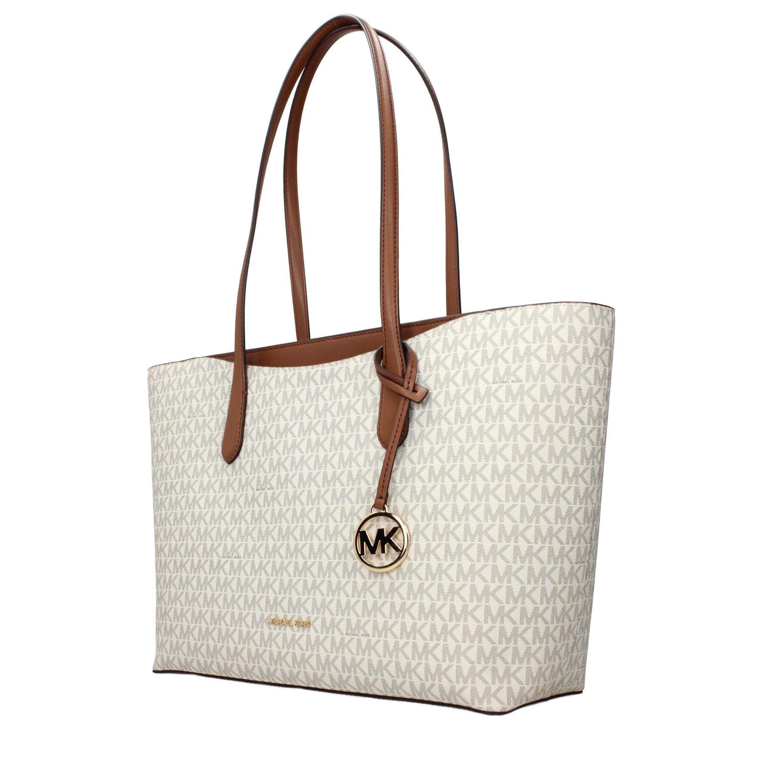 Beige Fabric Shoulder BagDescription: The product with MPN 35F5G4XT3BVANILLA and code F85139 fabric in beige is a shoulder bags designed by Michael Kors. It has features like logo, front detail, removable details.Beige Fabric Shoulder Bag${tagsMichael Kor