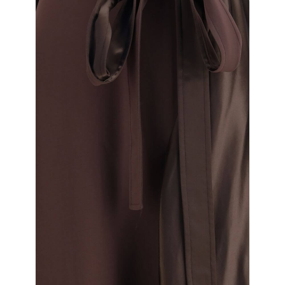 Brown Viscose Cocktail DressThe asymmetric Dress crafted from stretch viscose cady, enhanced by satin side panels that create a refined textural contrast. The draped cowl neckline softens the silhouette, while the waist is accentuated by a sash threaded t