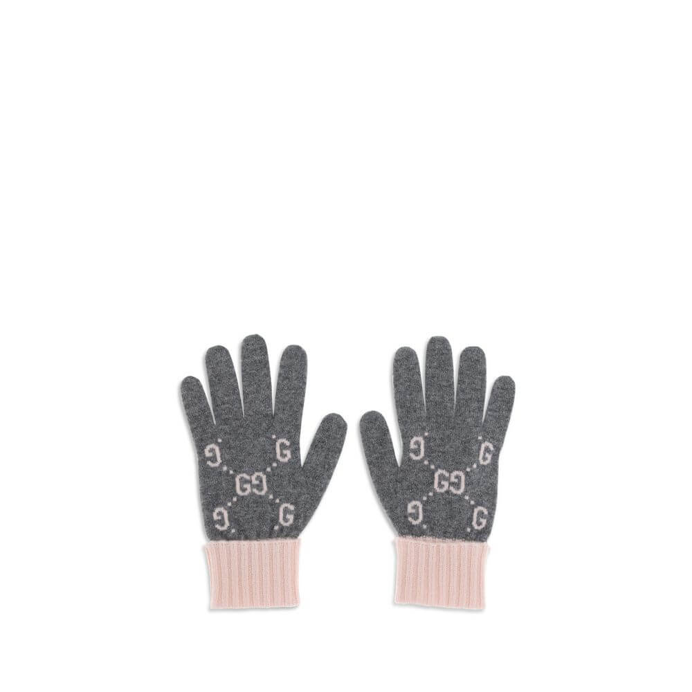 Cashmere GG GlovesCashmere GG Gloves by Gucci feature a five-finger design and contrasting ribbed elastic cuff. The all-over print GG motif adds a distinctive and refined touch to this stylish and comfortable accessory. Season: AW25 Composition: GENERAL 1
