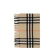 Beige Cashmere ScarfThe Wide Check Cashmere Scarf by Burberry combines the luxury of fine cashmere with the unmistakable House check pattern. Featuring a rectangular shape, fringed edges, and a subtle logo tag, it is a timeless accessory that elevates any