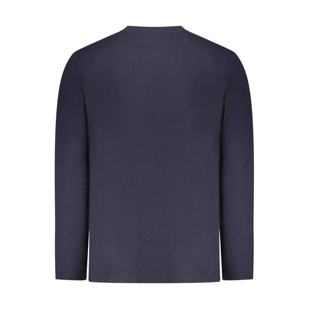 Blue Cotton Men SweaterElevate your wardrobe with the unmistakable class of Hugo Boss. This long-sleeved, crew neck sweater features the iconic Hugo Boss embroidery logo, offering a subtle nod to the brand’s storied heritage. Fashioned from a blend of pre