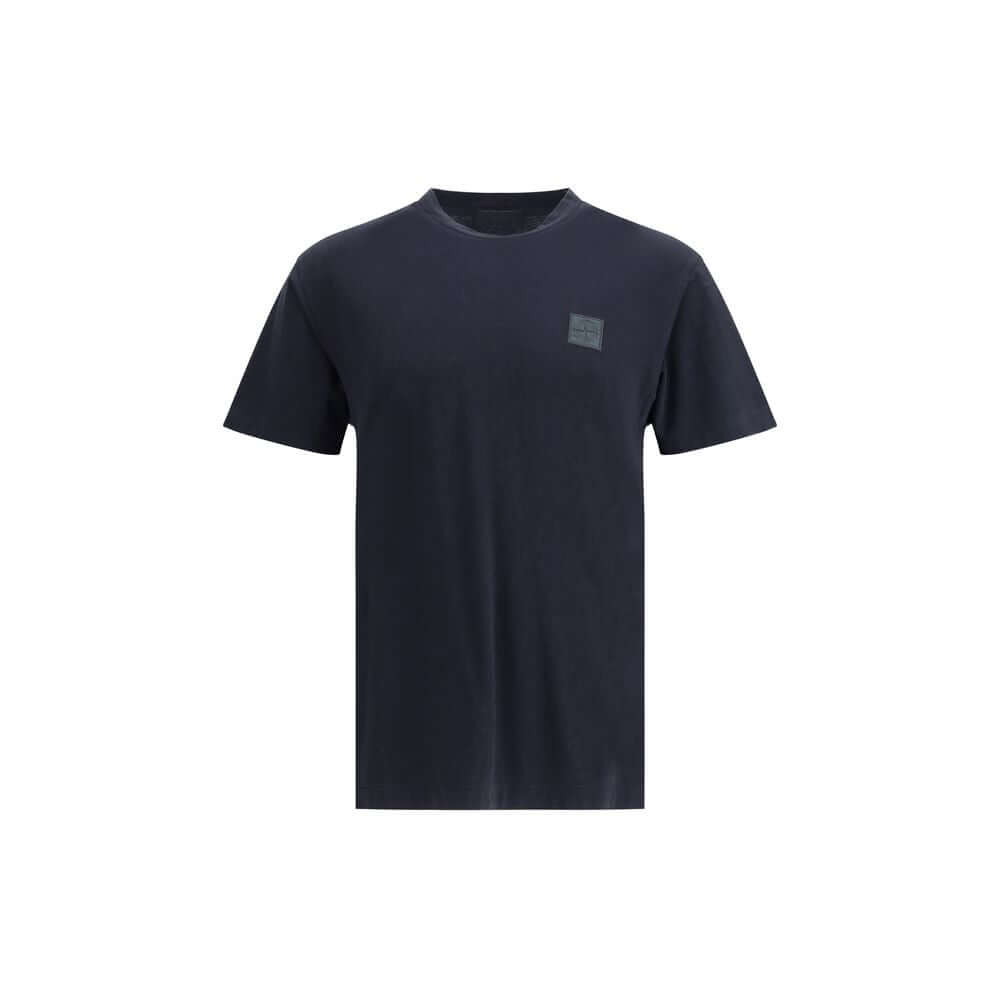 Blue Cotton T-ShirtThe Stone Island crew-neck T-shirt elevates a wardrobe essential with the brand’s signature approach. Crafted from cotton crêpe jersey, it features a garment-dyed finish, giving each piece unique depth of color. Designed with a slim fit