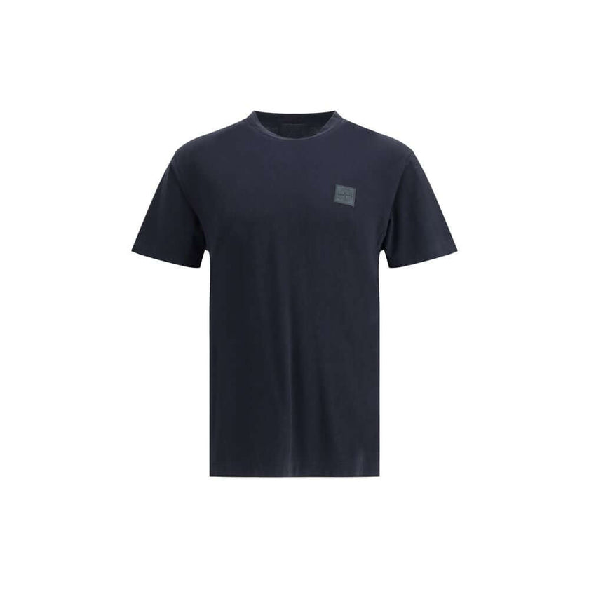 Blue Cotton T-ShirtThe Stone Island crew-neck T-shirt elevates a wardrobe essential with the brand’s signature approach. Crafted from cotton crêpe jersey, it features a garment-dyed finish, giving each piece unique depth of color. Designed with a slim fit