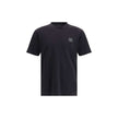 Black Cotton T-ShirtThe Stone Island crew-neck T-shirt elevates a wardrobe essential with the brand’s signature approach. Crafted from cotton crêpe jersey, it features a garment-dyed finish, giving each piece unique depth of color. Designed with a slim fi