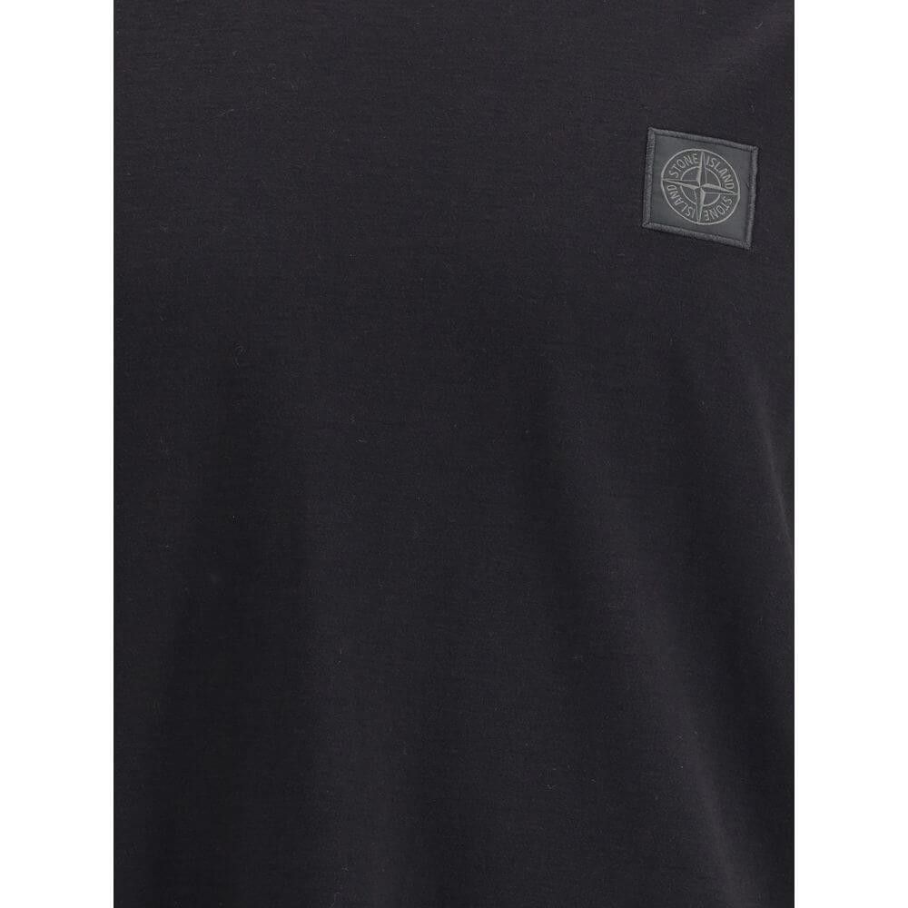 Black Cotton T-ShirtThe Stone Island crew-neck T-shirt elevates a wardrobe essential with the brand’s signature approach. Crafted from cotton crêpe jersey, it features a garment-dyed finish, giving each piece unique depth of color. Designed with a slim fi