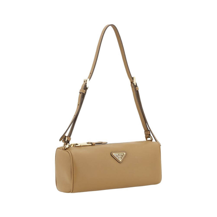 Beige Calf Leather Bos Taurus Shoulder BagPrada’s Leather Shoulder Bag is an elegant and versatile accessory, ideal for completing any look with a touch of understated luxury. The grained leather design lends a refined and durable texture, while the adjus