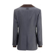 Gray Fleece Wool BlazerMiu Miu’s striped Blazer combines classic elegance with contemporary details. The single-breasted design features two welt flap pockets, a breast pocket and peaked lapels, while the ribbed collar and double sleeves add a touch of or
