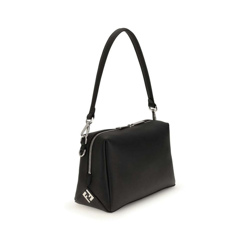 Black Calf Leather Bos Taurus Shoulder BagThe Lui Bag by Fendi features a soft, structured design with a clean, contemporary aesthetic. Crafted from black grained calf leather, it’s enhanced by a long double-slider zip and signature FF metal accents on th