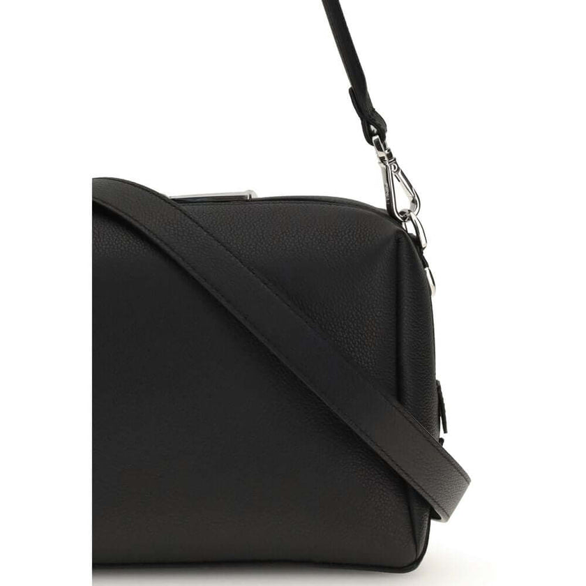 Black Calf Leather Bos Taurus Shoulder BagThe Lui Bag by Fendi features a soft, structured design with a clean, contemporary aesthetic. Crafted from black grained calf leather, it’s enhanced by a long double-slider zip and signature FF metal accents on th