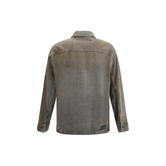 Gray Denim ShirtThe overdyed Denim Shirt by Fendi embodies a bold, contemporary spirit. Designed with dropped shoulders and chest patch pockets, it balances casual ease with refined craftsmanship. The front is fastened with logo-engraved metal buttons, ad