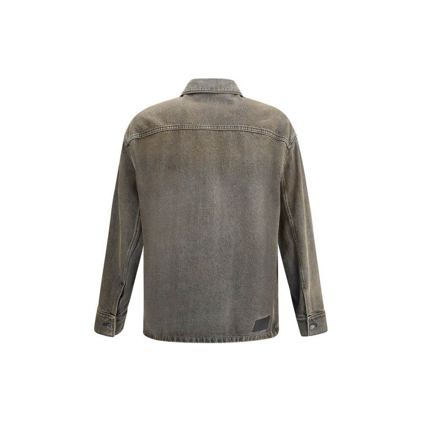 Gray Denim ShirtThe overdyed Denim Shirt by Fendi embodies a bold, contemporary spirit. Designed with dropped shoulders and chest patch pockets, it balances casual ease with refined craftsmanship. The front is fastened with logo-engraved metal buttons, ad