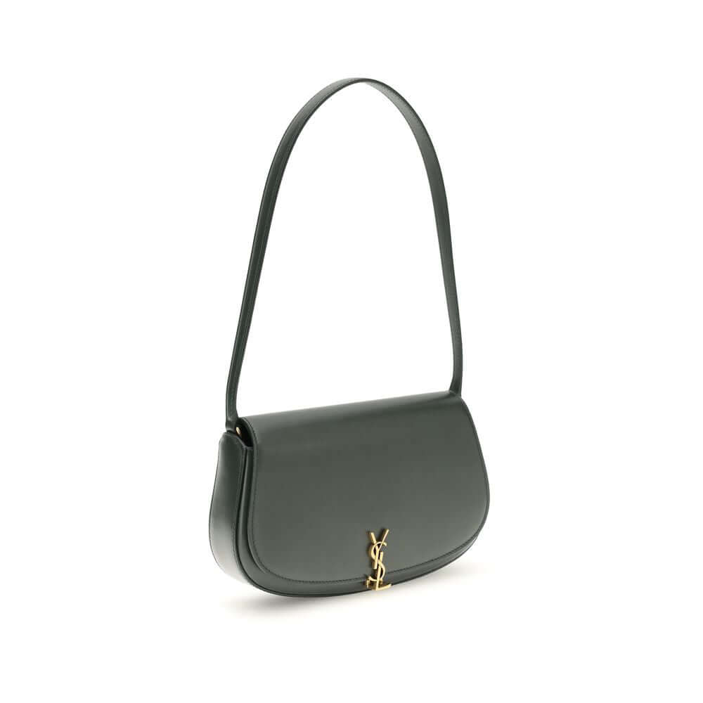 Green Calf Leather Bos Taurus Shoulder BagThe Voltaire mini Shoulder Bag by Saint Laurent is an elegant crescent-shaped bag crafted from calfskin with a lightly polished finish. Bronze-colored metallic parts add a warm, vintage touch, while the Cassandre