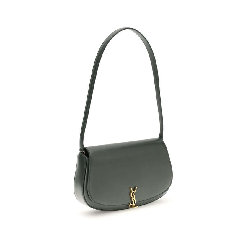 Green Calf Leather Bos Taurus Shoulder BagThe Voltaire mini Shoulder Bag by Saint Laurent is an elegant crescent-shaped bag crafted from calfskin with a lightly polished finish. Bronze-colored metallic parts add a warm, vintage touch, while the Cassandre