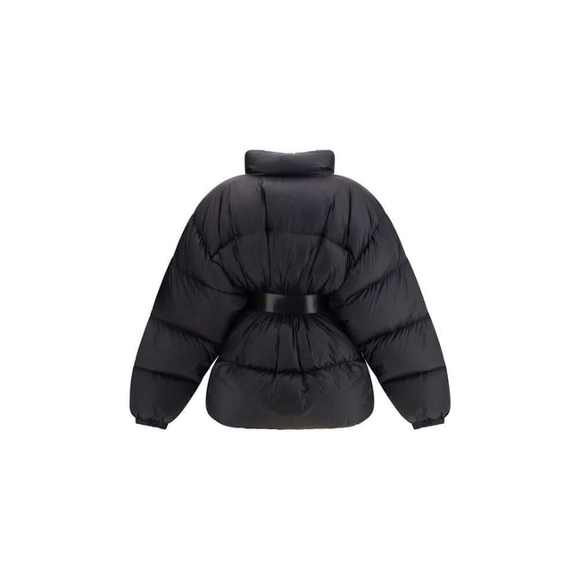 Black Polyamide Jackets And CoatThe Belted Hourglass Short Puffer reflects Balenciaga’s sculptural and contemporary vision. Crafted from lightweight technical fabric, it features a precisely constructed hourglass silhouette and a high stand-up collar that