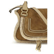 Beige Leather HandbagMarcie small Handbag by Chloé, made of suede and shearling leather, is a perfect balance of elegance and functionality. It can be carried by hand, over the shoulder or over the shoulder thanks to the removable leather strap via hooks.
