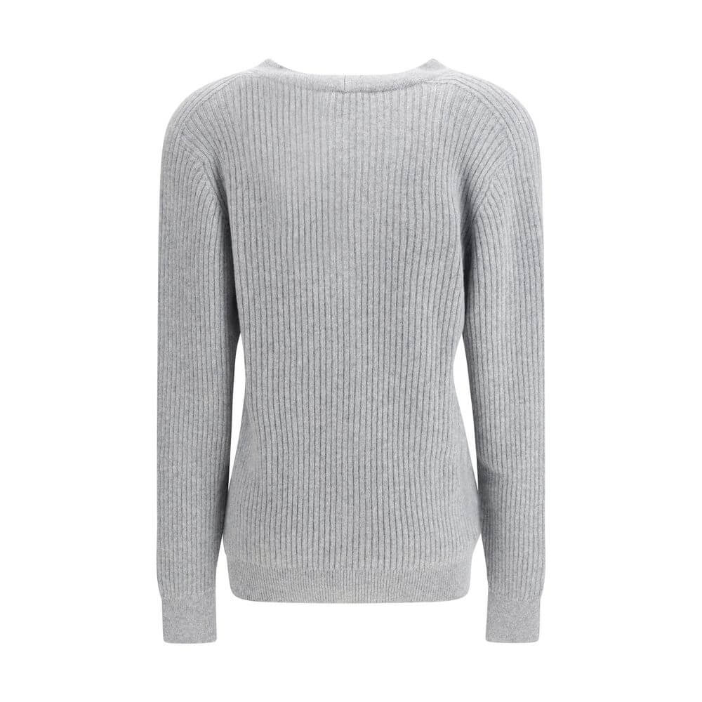 Gray Fleece Wool CardiganThe long cashmere Cardigan by Balmain represents the perfect fusion of comfort and sophistication, typical of the brand. The soft, elongated line is defined by the deep V-neckline and ribbed edges that emphasize its structure with