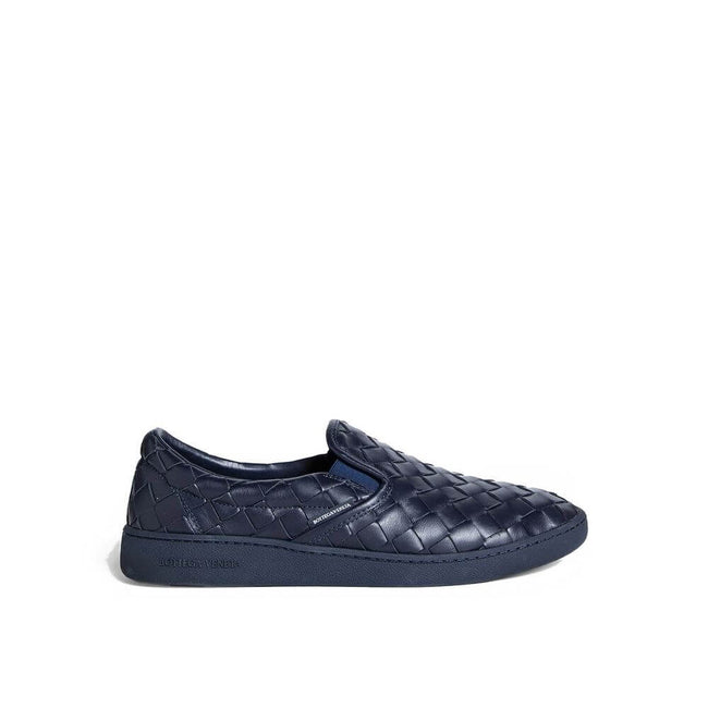 Blue Calfskin Low Top SneakersDescription: – Composition: 100% calf leather – Inner: Leather – Insole: Leather – Sole: Rubber – Round toe – Branded insole – Slip-on design – All-over Intrecciato – Made in Italy – Gender: MEN –Blue Calfskin Low Top Sneaker