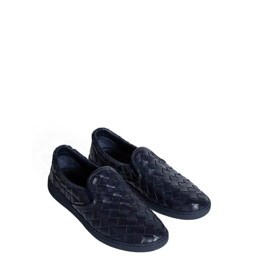 Blue Calfskin Low Top SneakersDescription: – Composition: 100% calf leather – Inner: Leather – Insole: Leather – Sole: Rubber – Round toe – Branded insole – Slip-on design – All-over Intrecciato – Made in Italy – Gender: MEN –Blue Calfskin Low Top Sneaker