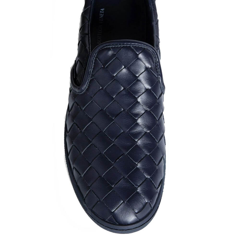 Blue Calfskin Low Top SneakersDescription: – Composition: 100% calf leather – Inner: Leather – Insole: Leather – Sole: Rubber – Round toe – Branded insole – Slip-on design – All-over Intrecciato – Made in Italy – Gender: MEN –Blue Calfskin Low Top Sneaker