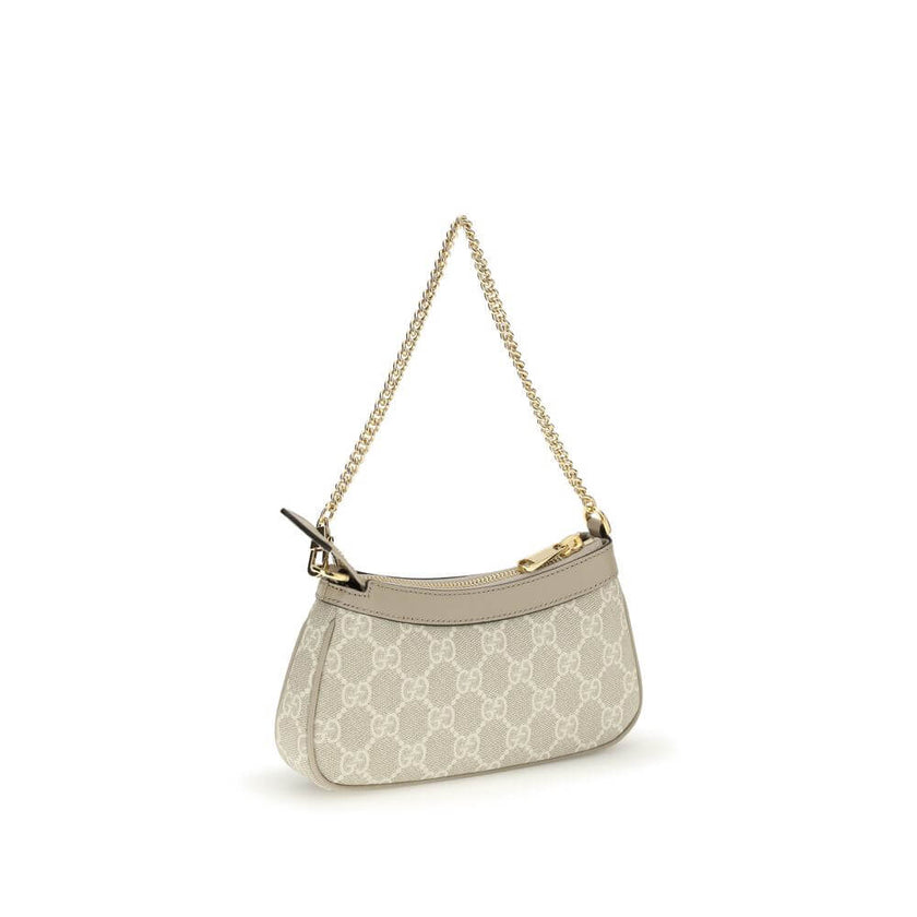 Ophidia Mini Shoulder BagOphidia Mini Shoulder Bag by Gucci is an elegant accessory in beige and white GG Supreme fabric with beige leather trim that accentuates its sophistication. Gold-tone hardware and the Double G logo add a distinctive and luxurious