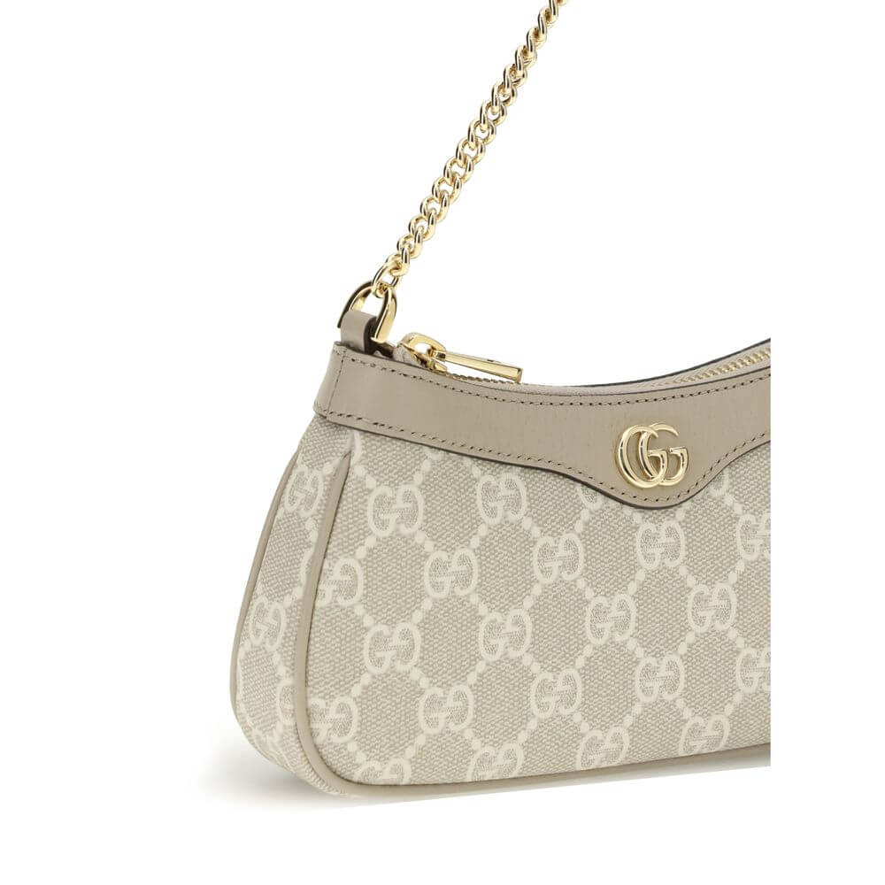 Ophidia Mini Shoulder BagOphidia Mini Shoulder Bag by Gucci is an elegant accessory in beige and white GG Supreme fabric with beige leather trim that accentuates its sophistication. Gold-tone hardware and the Double G logo add a distinctive and luxurious