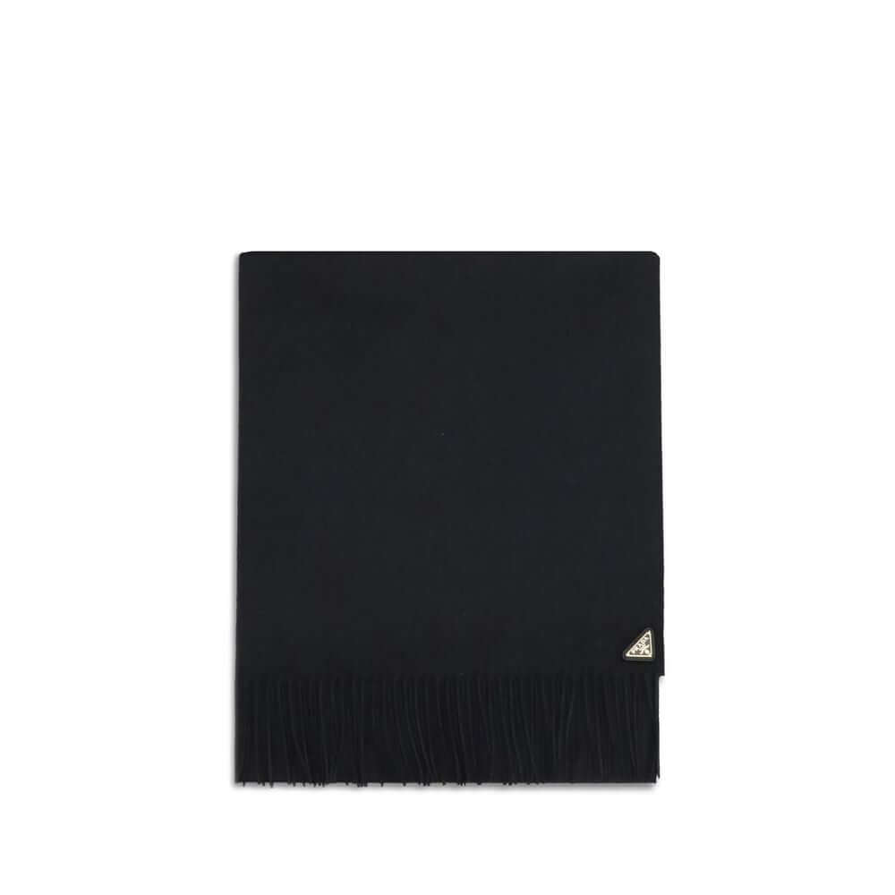 Silk and cashmere ScarfThe silk and cashmere Scarf by Prada is an elegant and lightweight accessory, perfect for adding a touch of sophistication to any look. Finished with frayed edges, it is embellished with the characteristic enameled metal logo triang