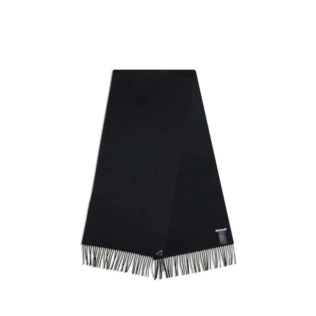 Silk and cashmere ScarfThe silk and cashmere Scarf by Prada is an elegant and lightweight accessory, perfect for adding a touch of sophistication to any look. Finished with frayed edges, it is embellished with the characteristic enameled metal logo triang