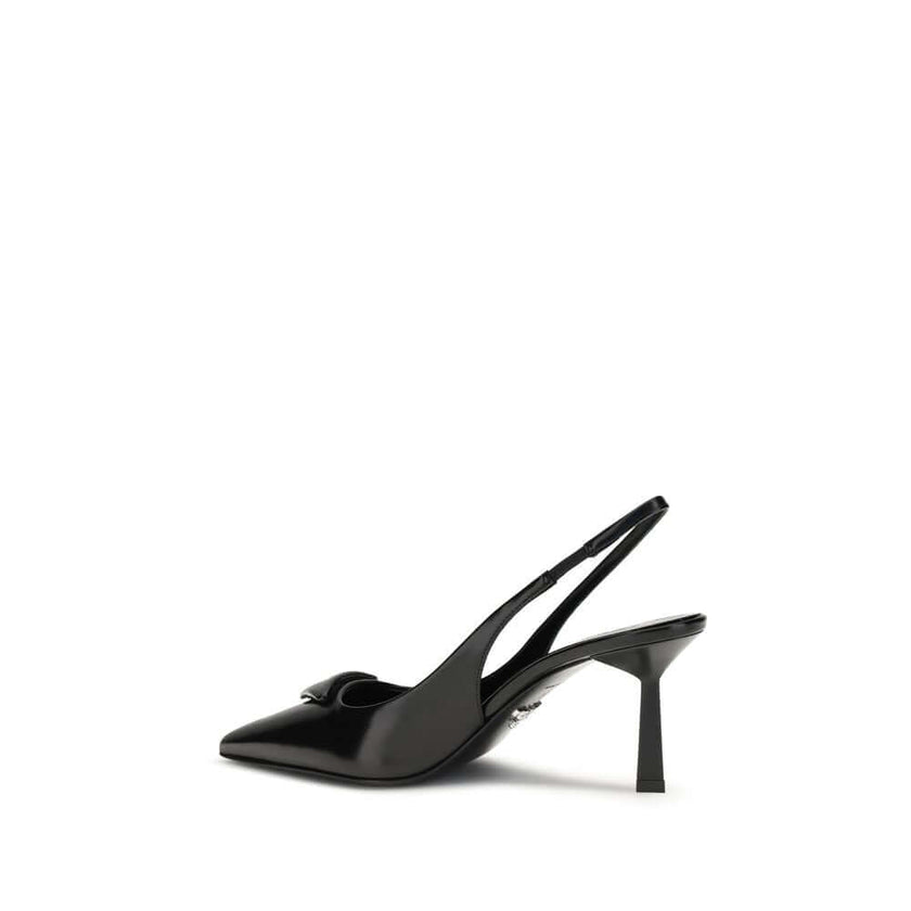 Black Leather High Heel PumpsThe leather slingback Pumps by Prada express contemporary elegance with clean lines and iconic details. Made of smooth leather, they are embellished with the classic tonal leather triangle logo on the front. The pointed toe mo