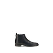 Black Leather Ankle BootsThe leather Ankle Boots by Prada reinterpret a wardrobe classic with essential lines and distinctive details. The upper is enriched with elastic side inserts and a rear pull-on for a quick and practical fit. The leather lining ens