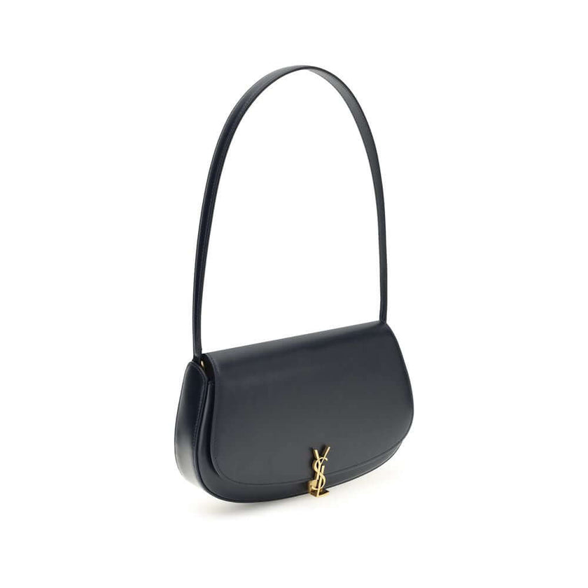 Blue Calf Leather Bos Taurus Shoulder BagThe Voltaire mini Shoulder Bag by Saint Laurent is an elegant crescent-shaped bag crafted from calfskin with a lightly polished finish. Bronze-colored metallic parts add a warm, vintage touch, while the Cassandre m