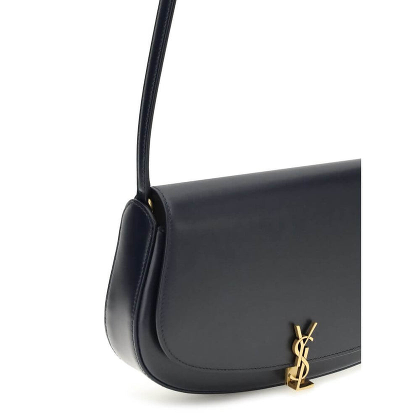 Blue Calf Leather Bos Taurus Shoulder BagThe Voltaire mini Shoulder Bag by Saint Laurent is an elegant crescent-shaped bag crafted from calfskin with a lightly polished finish. Bronze-colored metallic parts add a warm, vintage touch, while the Cassandre m