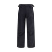 Black Cotton Cargo PantsThe Cargo Pants by Balenciaga represent the brand’s contemporary vision, where urban aesthetics meet the balance between form and function. Made of soft left-hand denim, they wrap with structure and comfort, defining a silhouette w