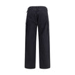 Black Cotton Cargo PantsThe Cargo Pants by Balenciaga represent the brand’s contemporary vision, where urban aesthetics meet the balance between form and function. Made of soft left-hand denim, they wrap with structure and comfort, defining a silhouette w